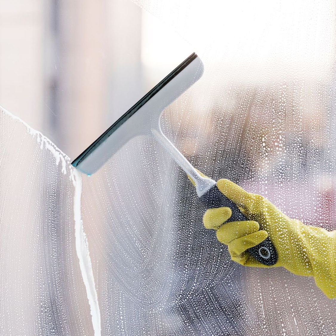 Fönsterskrapa mot fönster